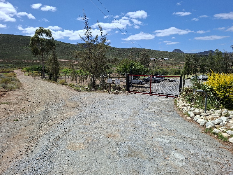 Continue past the golf club gate